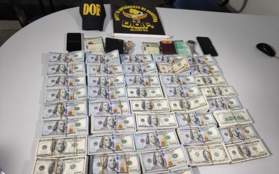 Pecuarista e primo são presos com 400 mil dólares da venda de cocaína