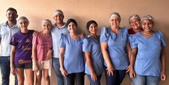 Geissy e sua equipe de trabalho